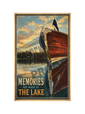 Memories Are Made at the Lake vintage poster featuring the glowing mahogany bow of a classic wooden boat reflected in golden sunset lake water with pine trees and cabin on shore
